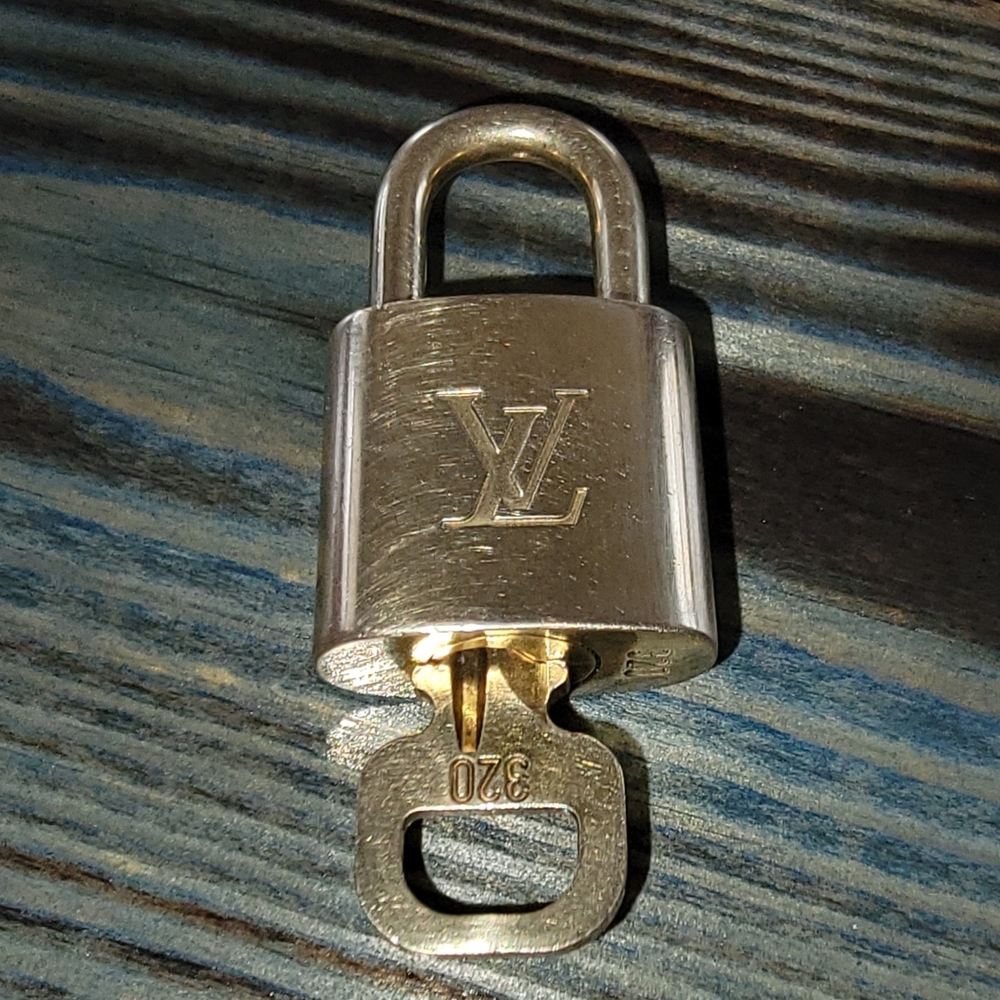 Louis Vuitton lock and key. #320